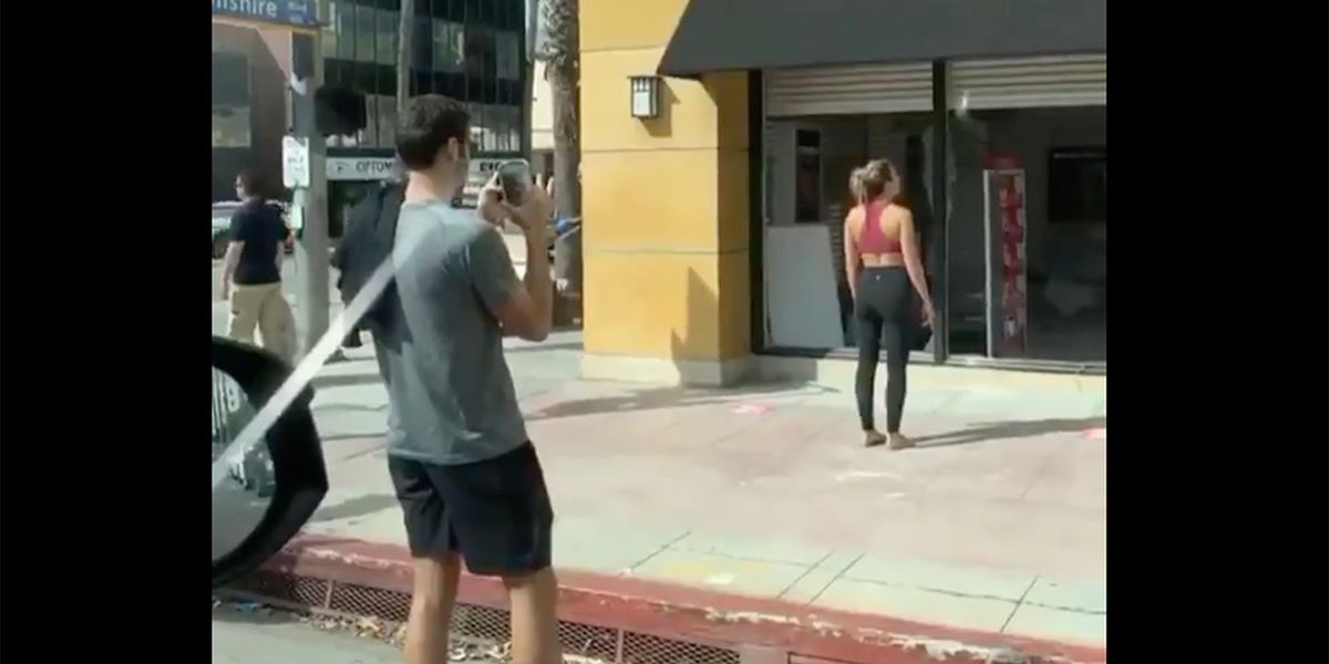 Influencer Takes Photo In Front of a Smashed Storefront ...