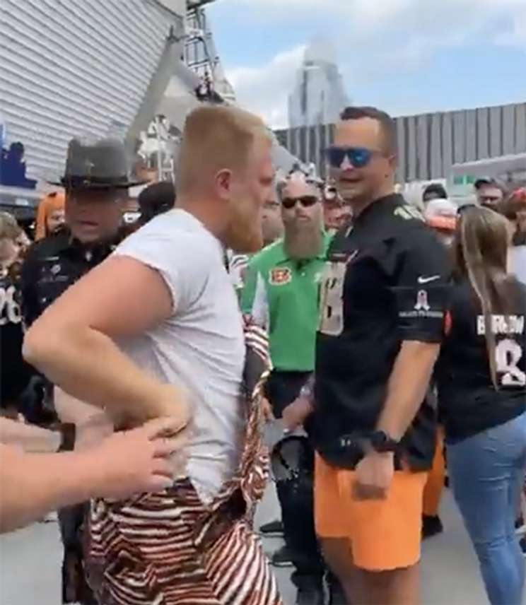 Handcuffed Bengals Fan In Zubaz Overalls Knocks Out Another Fan